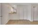 Hallway with tile flooring, white doors, and a built-in closet at 4642 Via San Rafael, Las Vegas, NV 89103