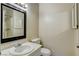 Bathroom featuring vanity with sink, toilet, and a shower with curtain at 4721 Via Renaldo, Las Vegas, NV 89103