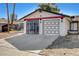 Single-story home with two-car garage and security gate in a sunny residential area at 4721 Via Renaldo, Las Vegas, NV 89103