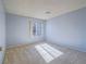 Bright bedroom with a window and neutral carpet at 4800 Nara Vista Way # 204, Las Vegas, NV 89103