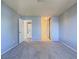 Bedroom with carpet, laundry, and bathroom access at 4800 Nara Vista Way # 204, Las Vegas, NV 89103