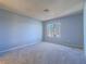 Bright bedroom featuring light walls and a large window at 4800 Nara Vista Way # 204, Las Vegas, NV 89103