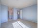 Spacious bedroom with light walls and carpeting at 4800 Nara Vista Way # 204, Las Vegas, NV 89103