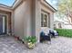 Cozy patio area with comfortable seating and potted plants at 49 Strada Caruso, Henderson, NV 89011