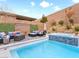 Entertaining pool and spa with comfortable seating at 49 Strada Caruso, Henderson, NV 89011