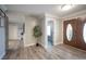 Inviting entryway with hardwood floors and a decorative door at 5515 Coley Ave, Las Vegas, NV 89146