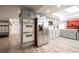 Spacious kitchen featuring stainless steel appliances, gray cabinets and wood look floors at 5515 Coley Ave, Las Vegas, NV 89146