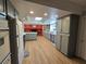 Modern kitchen with gray cabinets and a breakfast bar at 5515 Coley Ave, Las Vegas, NV 89146