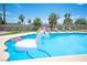 Inviting backyard pool area with a fun unicorn float and lounge chairs, perfect for summer relaxation and entertainment at 5515 Coley Ave, Las Vegas, NV 89146