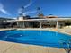 Inviting backyard pool with a covered patio area, ideal for outdoor entertaining and relaxation at 5515 Coley Ave, Las Vegas, NV 89146