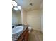 Bathroom with granite countertop, single sink, and toilet at 569 Sellers Pl # 569, Henderson, NV 89011