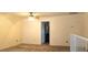 Loft bedroom with carpet, ceiling fan, and access to bathroom at 569 Sellers Pl # 569, Henderson, NV 89011