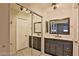 Bathroom with double vanity, gray cabinets, and marble countertop at 722 Barrie Ct, Henderson, NV 89002