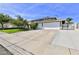 Two-car garage and nicely landscaped front yard at 722 Barrie Ct, Henderson, NV 89002