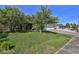 House with a lush lawn and a two-car garage at 722 Barrie Ct, Henderson, NV 89002