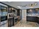 Modern kitchen with stainless steel appliances and granite countertops at 722 Barrie Ct, Henderson, NV 89002