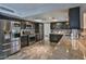 Modern kitchen with stainless steel appliances and granite countertops at 722 Barrie Ct, Henderson, NV 89002