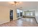 Bright living room with hardwood floors and a view of the kitchen at 722 Barrie Ct, Henderson, NV 89002