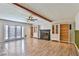 Living room with wood floors, fireplace, and built-in shelving at 722 Barrie Ct, Henderson, NV 89002