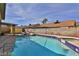 Large backyard pool with storage shed and patio furniture at 722 Barrie Ct, Henderson, NV 89002