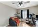 Cozy bedroom featuring a comfortable lounge area and home office at 7300 Pirates Cove Rd # 2013, Las Vegas, NV 89145