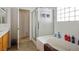 Clean bathroom with shower/tub combo and updated vanity at 7436 Wagonwheel Ranch Way, Las Vegas, NV 89113