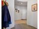 Bright entryway with tile floors, coat rack, and framed artwork at 7436 Wagonwheel Ranch Way, Las Vegas, NV 89113