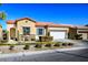 Single-story home with front yard landscaping and two-car garage at 7436 Wagonwheel Ranch Way, Las Vegas, NV 89113