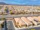 Aerial view of a residential neighborhood with desert landscaping and mountain views in the distance at 7611 Redcloud Peak St, Las Vegas, NV 89166