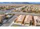 Aerial view of a residential neighborhood with desert landscaping and mountain views in the distance at 7611 Redcloud Peak St, Las Vegas, NV 89166