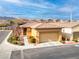 Attractive single-story home with a two-car garage and well-maintained landscaping at 7611 Redcloud Peak St, Las Vegas, NV 89166