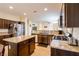 Spacious kitchen with stainless steel appliances, granite countertops, and center island at 7611 Redcloud Peak St, Las Vegas, NV 89166