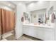 Double vanity bathroom with a shower/tub combo at 7747 Harthill Park Ave, Las Vegas, NV 89113