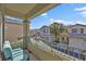 Balcony view showcases the neighborhood street at 7868 Running Doe Ct, Las Vegas, NV 89149