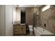 Contemporary bathroom with soaking tub, vanity, and wood-look wall at 8316 Broad Peak Dr, Las Vegas, NV 89131