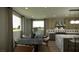 Kitchen dining area with a large table and modern chairs at 8316 Broad Peak Dr, Las Vegas, NV 89131