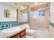 Bathroom with shower/tub combo and granite vanity at 8600 Kiel Ridge Cir, Las Vegas, NV 89117