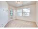 Bright bedroom with carpet and access to balcony at 8600 Kiel Ridge Cir, Las Vegas, NV 89117