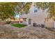 Backyard with artificial turf and a large patio area at 9178 Sunken Meadow Ave, Las Vegas, NV 89178