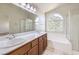 Double vanity bathroom with shower, tub and window at 9178 Sunken Meadow Ave, Las Vegas, NV 89178