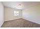 Simple bedroom with neutral walls and carpet at 9178 Sunken Meadow Ave, Las Vegas, NV 89178