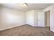 Bright bedroom with neutral walls and carpet at 9178 Sunken Meadow Ave, Las Vegas, NV 89178