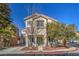 Two-story house with attached garage and landscaping at 9178 Sunken Meadow Ave, Las Vegas, NV 89178