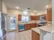 Bright kitchen with stainless steel appliances and tile floor at 9178 Sunken Meadow Ave, Las Vegas, NV 89178