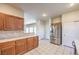 Modern kitchen features stainless steel appliances and ample wood cabinetry at 9178 Sunken Meadow Ave, Las Vegas, NV 89178