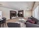 Spacious living room featuring a neutral color palette and ample natural light at 9178 Sunken Meadow Ave, Las Vegas, NV 89178