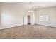 Main bedroom featuring a chandelier and walk-in closet at 9178 Sunken Meadow Ave, Las Vegas, NV 89178