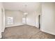 Main bedroom with high ceilings, chandelier and access to bathroom at 9178 Sunken Meadow Ave, Las Vegas, NV 89178