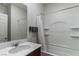 Clean bathroom with tub, shower, and vanity with sink at 9217 Quartz Hills Ave, Las Vegas, NV 89178