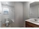 Clean bathroom with tub, toilet and vanity at 9217 Quartz Hills Ave, Las Vegas, NV 89178